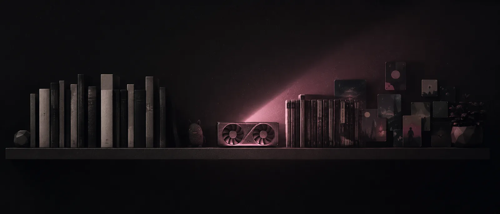 A dark shelf of books, steelbooks and a graphics card in pink light.