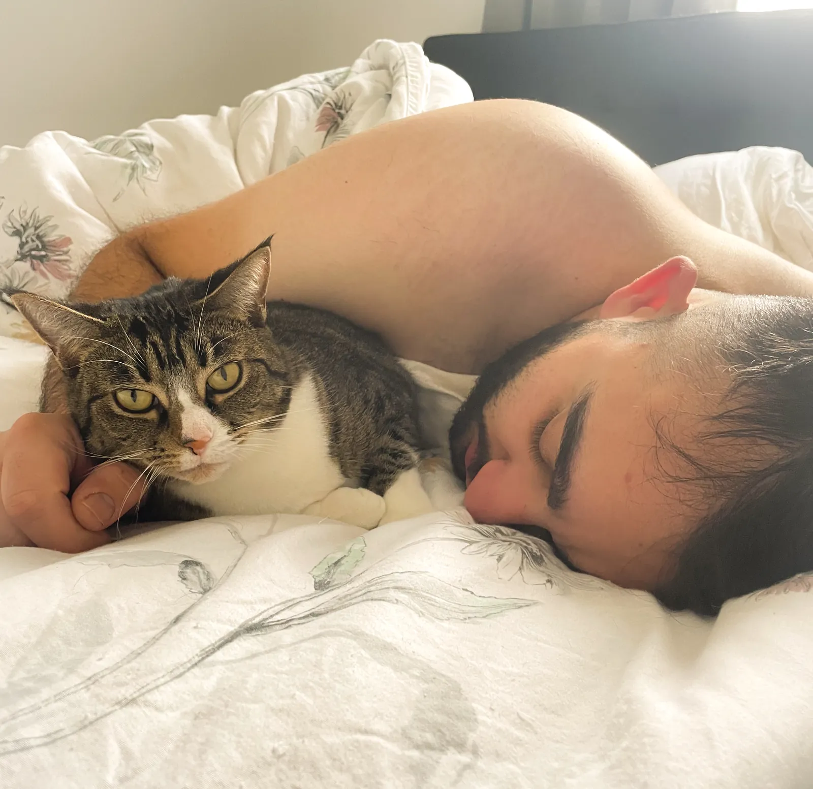 Asleep with Lucy tucked against my shoulder.